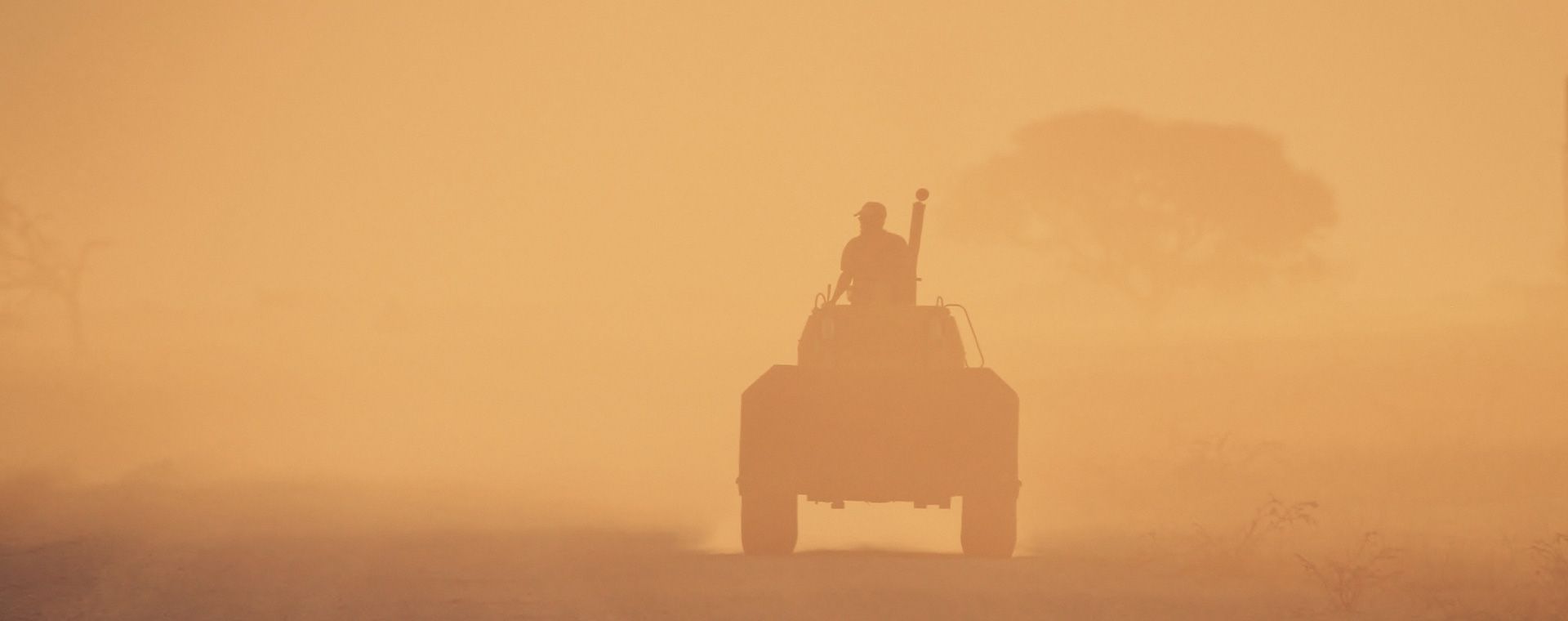 African farmer on a tractor